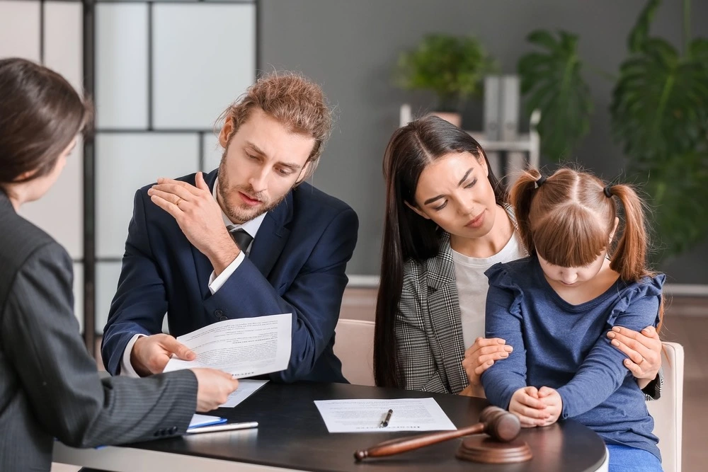 Family consulting with a lawyer in an office setting, illustrating exceptions that may extend your filing deadline.