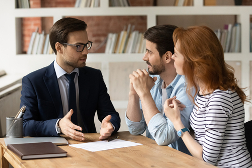 Parents consulting with a birth injury lawyer, illustrating how Pennsylvania birth injury lawyers work on a contingency fee basis.